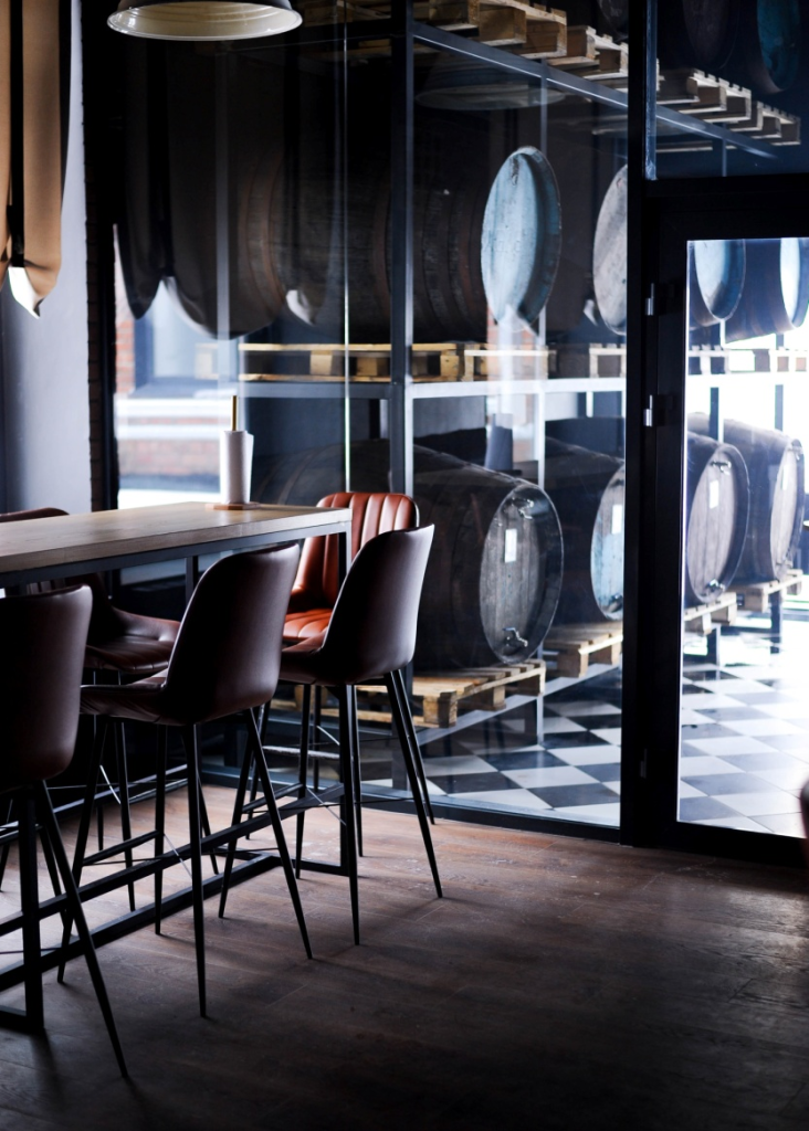 Interior of a restaurant with wine barrels